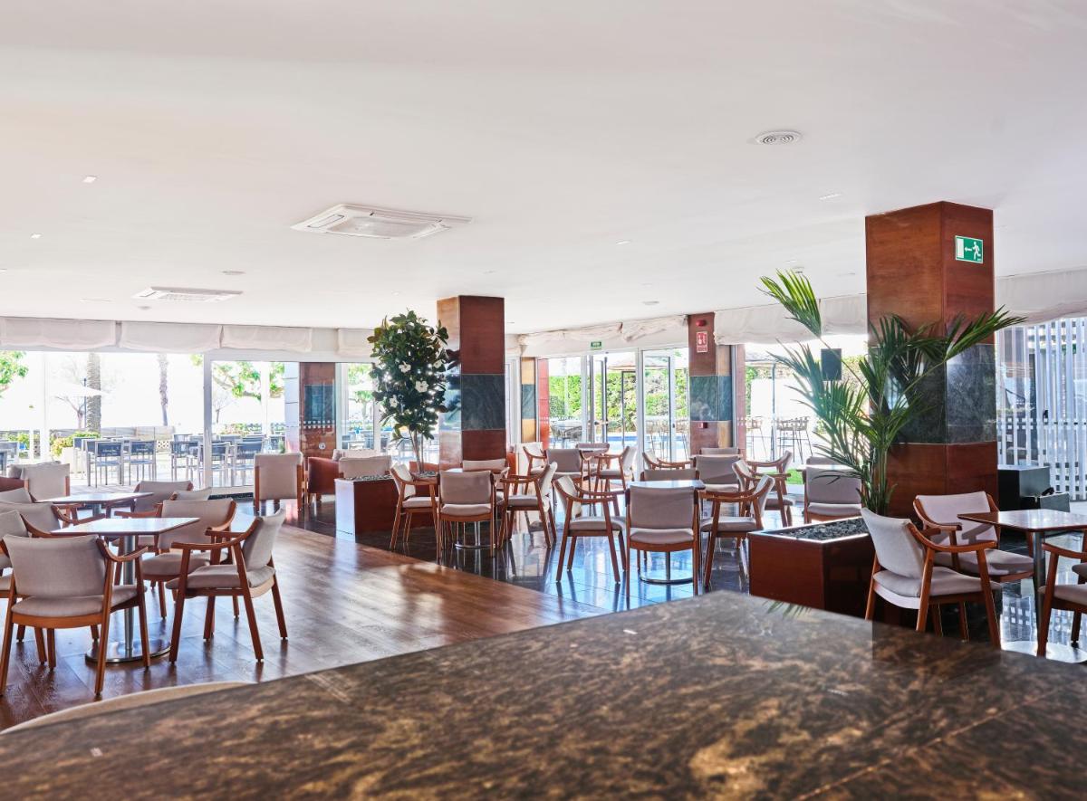 Un restaurante o sitio para comer en Prestige Victoria