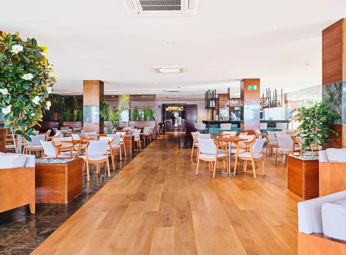Un restaurante o sitio para comer en Prestige Victoria