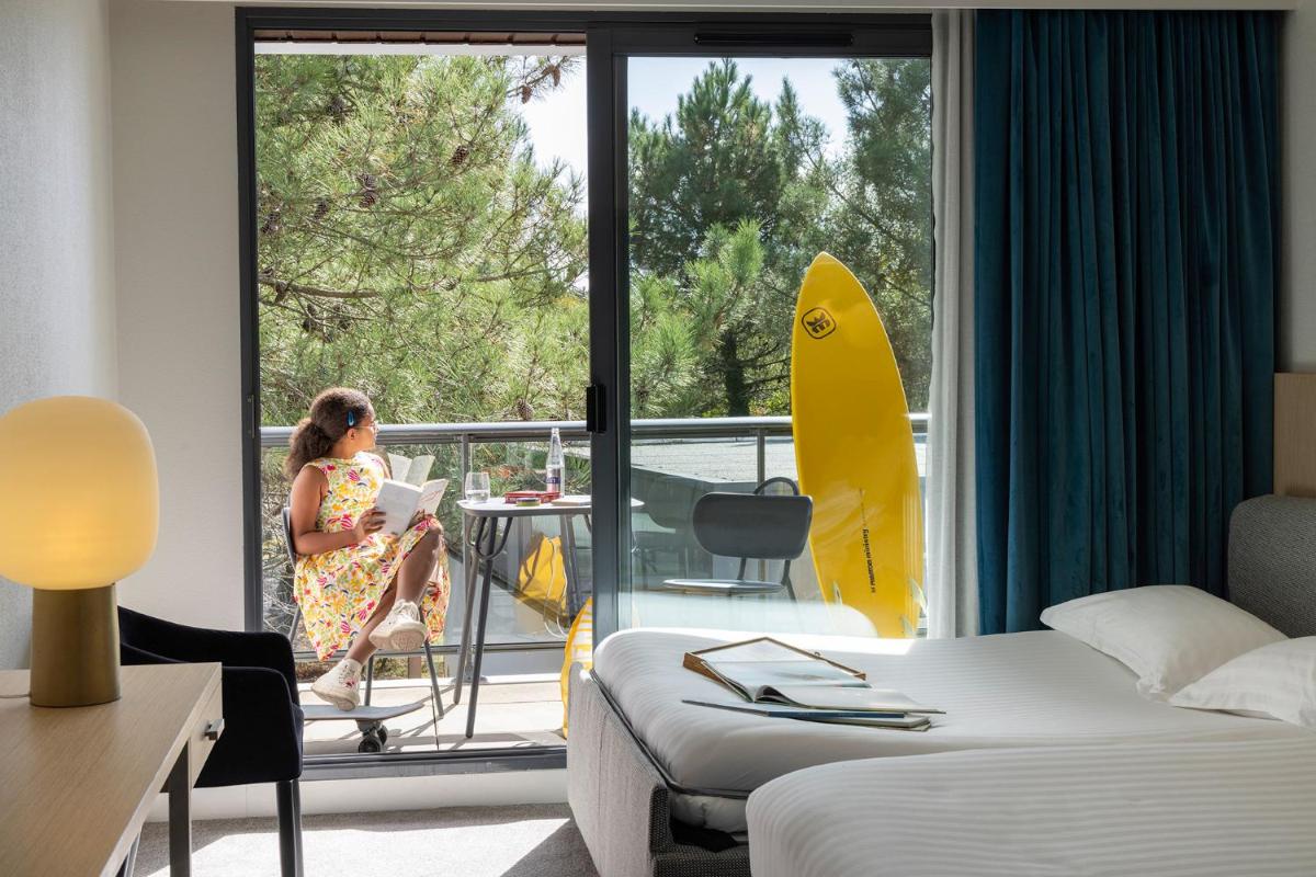 Un ou plusieurs lits dans un hébergement de l'établissement Best Western Plus Hotel les Rives du Ter