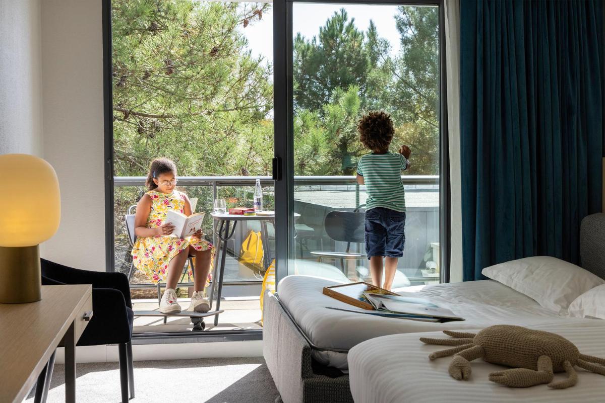 Un ou plusieurs lits dans un hébergement de l'établissement Best Western Plus Hotel les Rives du Ter