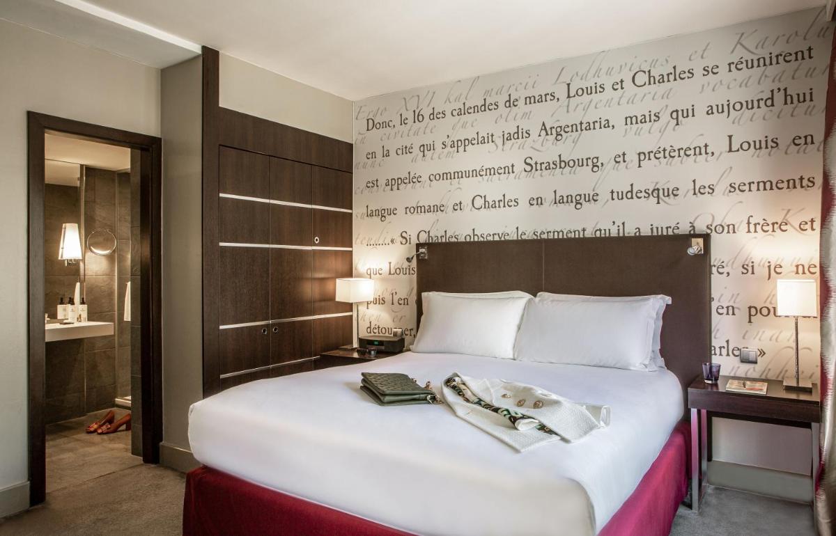 Un ou plusieurs lits dans un hébergement de l'établissement Sofitel Strasbourg Grande Ile