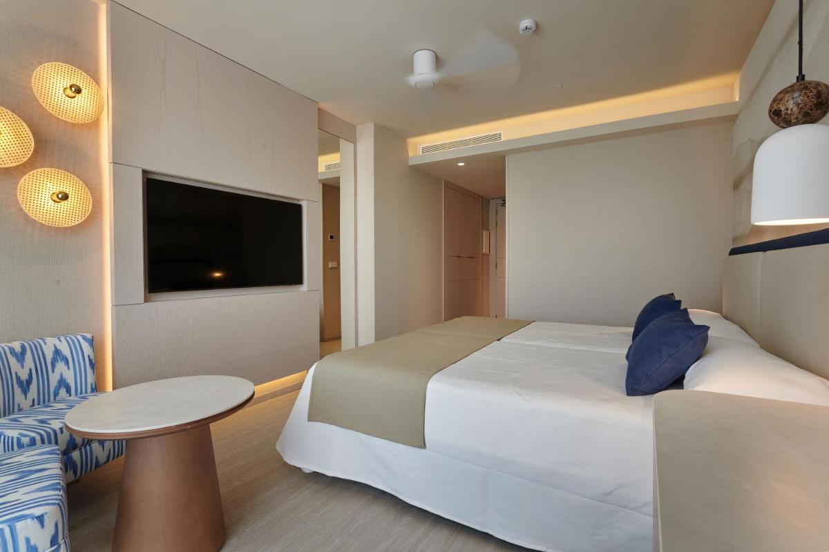Cama o camas de una habitación en Hipotels Flamenco