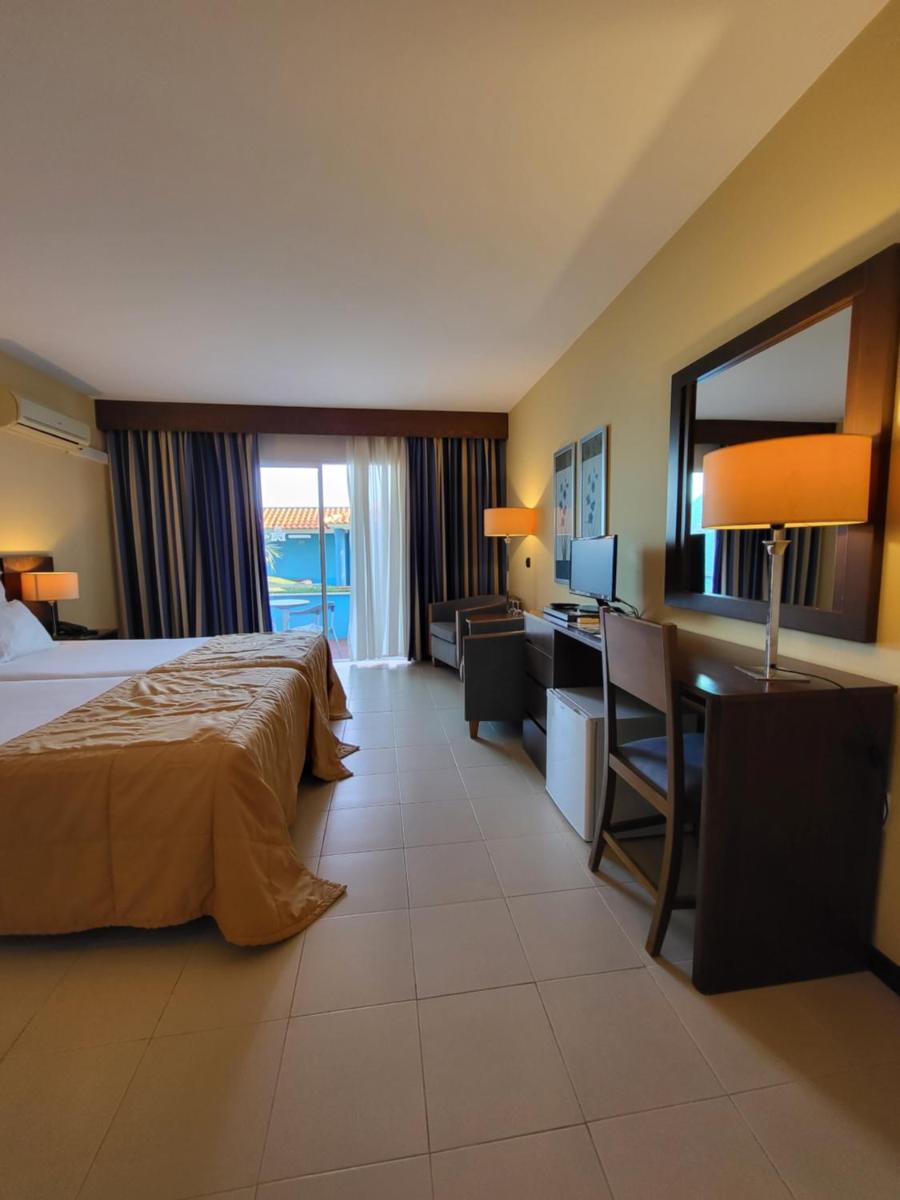 Uma cama ou camas num quarto em Hotel Roca Mar