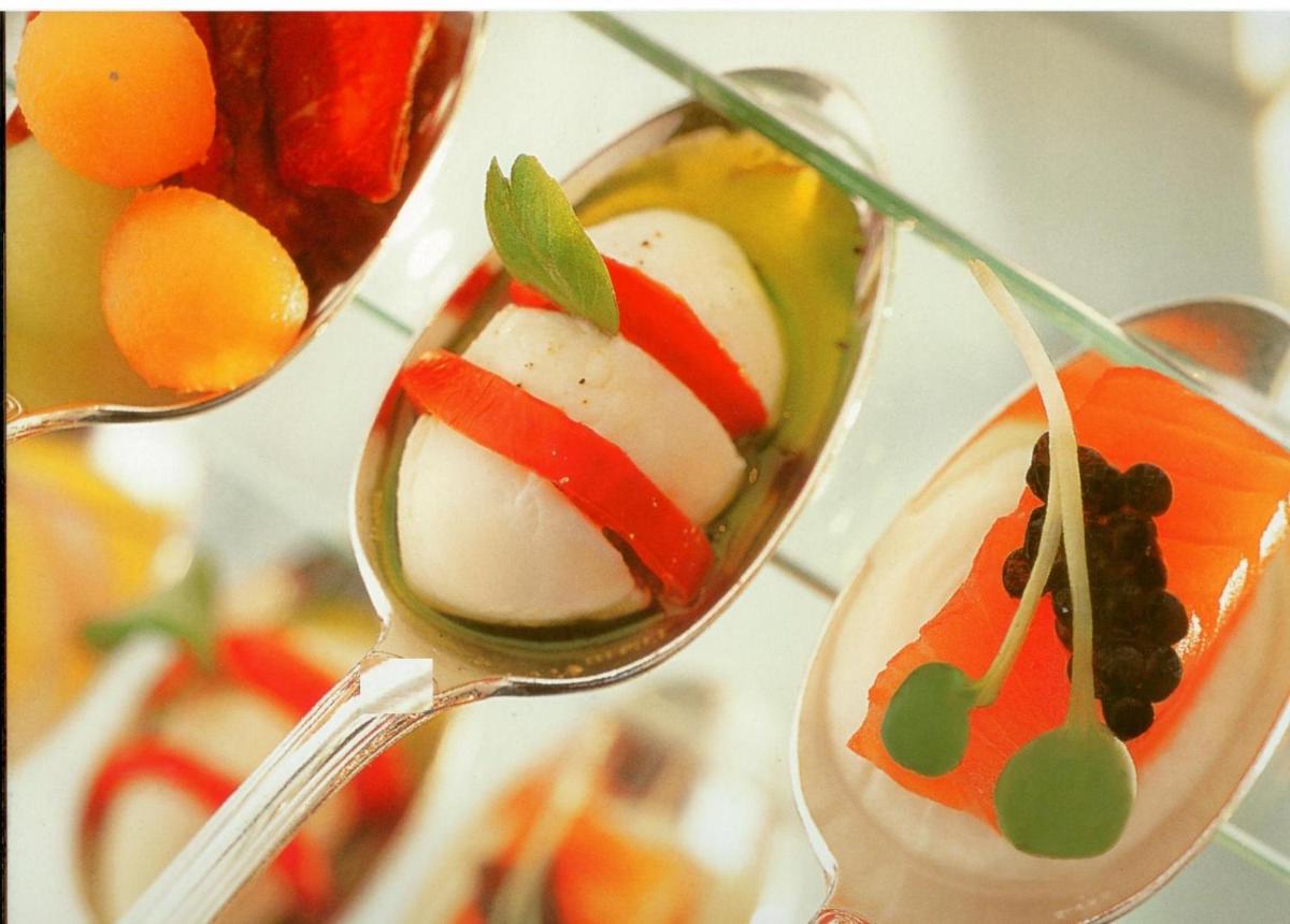 two spoons filled with different types of food at The Raj Palace (Small Luxury Hotels of the World) in Jaipur