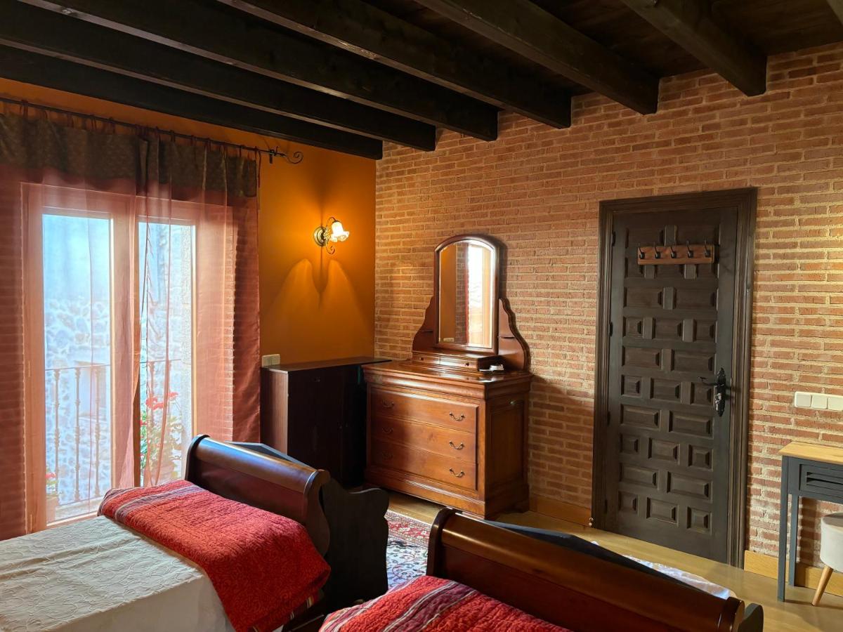 Cama o camas de una habitación en Terraplén Seis Boutique Hotel