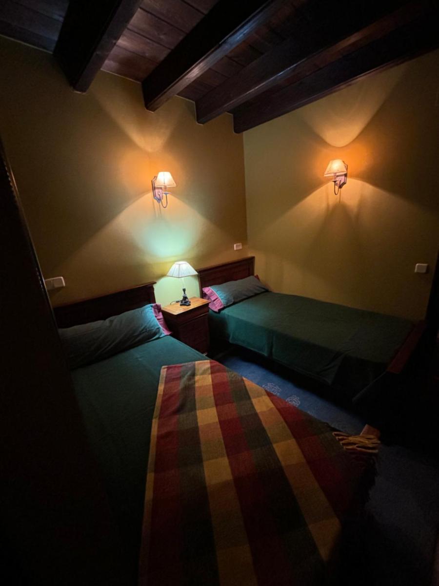 Cama o camas de una habitación en Terraplén Seis Boutique Hotel