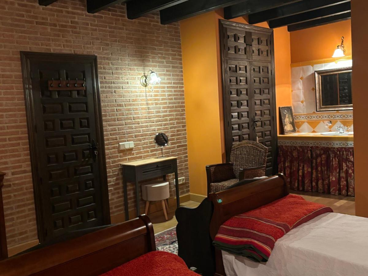 Cama o camas de una habitación en Terraplén Seis Boutique Hotel