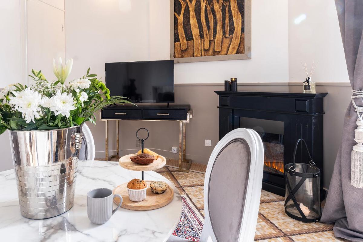 Télévision ou salle de divertissement dans l'établissement Château de Tressé