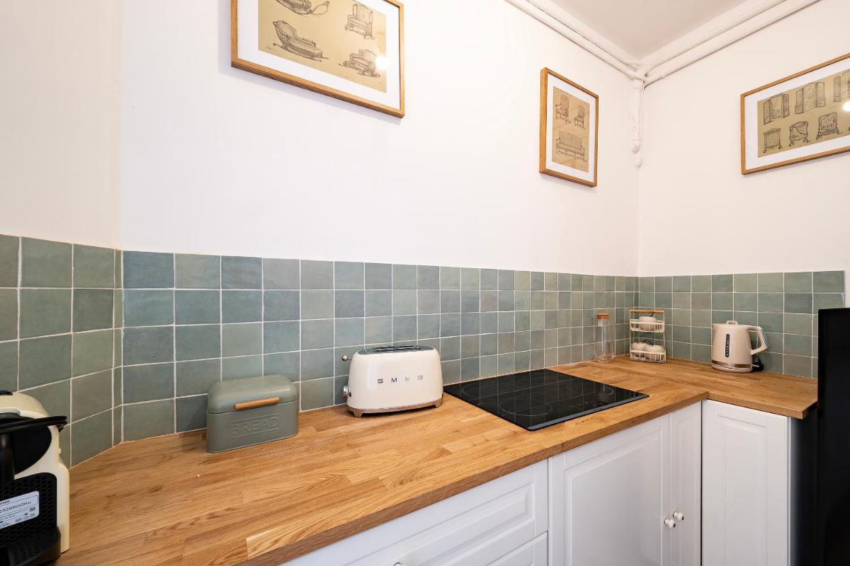 Cuisine ou kitchenette dans l'établissement Château de Tressé