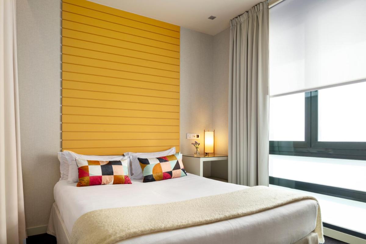Cama o camas de una habitación en Hotel Miró