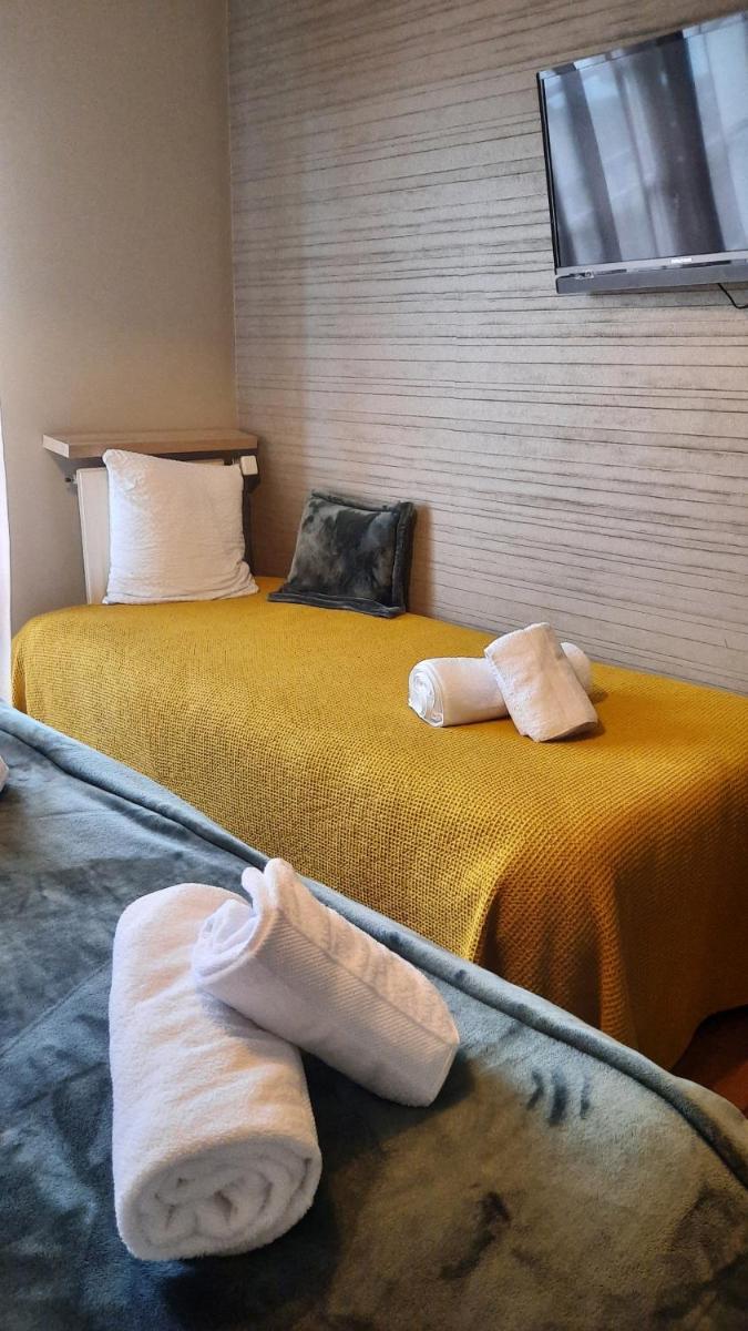 Un ou plusieurs lits dans un hébergement de l'établissement Hotel Mendionde