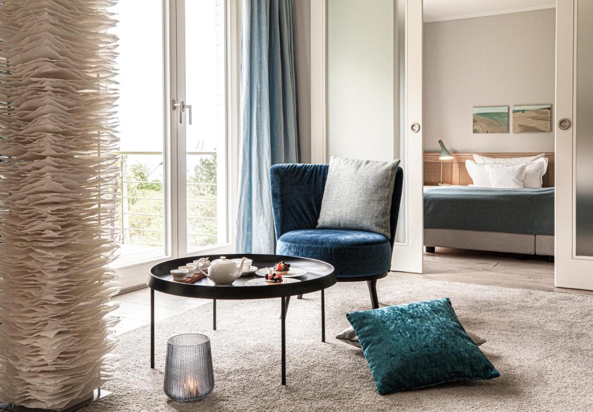 Ein Bett oder Betten in einem Zimmer der Unterkunft Hotel Fährhaus