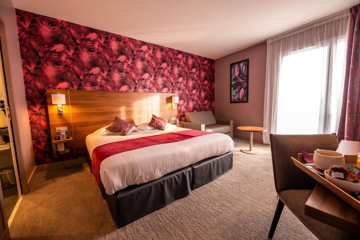 Un ou plusieurs lits dans un hébergement de l'établissement Best Western Eden SPA