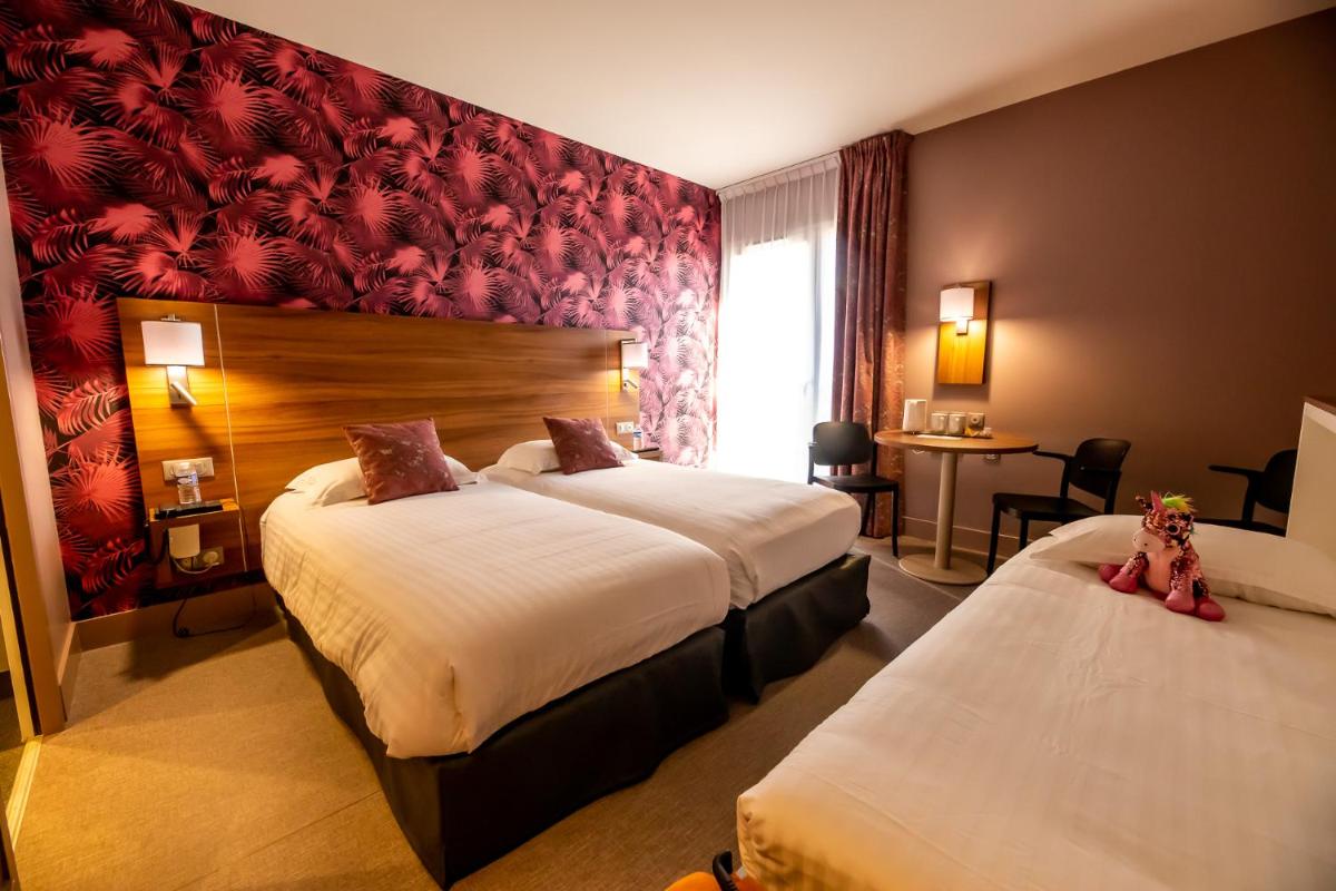 Un ou plusieurs lits dans un hébergement de l'établissement Best Western Eden SPA