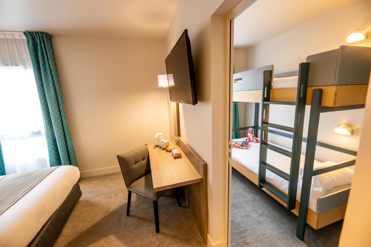Un ou plusieurs lits dans un hébergement de l'établissement Best Western Eden SPA