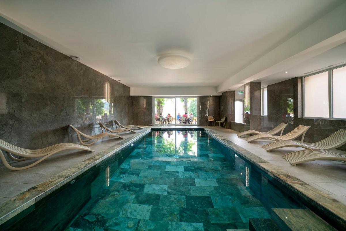 Piscine de l'établissement Hotel Munsch Restaurant & Wellness, Colmar Nord - Haut-Koenigsbourg ou située à proximité
