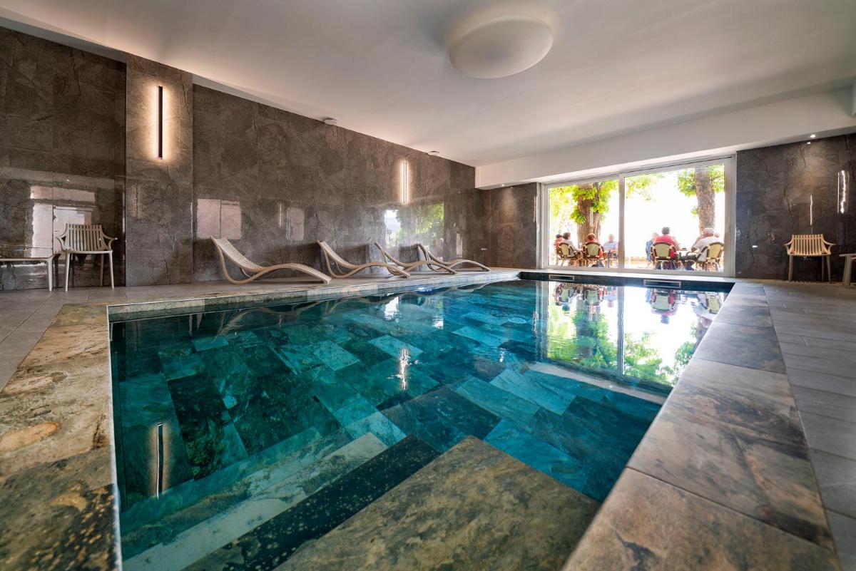 Piscine de l'établissement Hotel Munsch Restaurant & Wellness, Colmar Nord - Haut-Koenigsbourg ou située à proximité