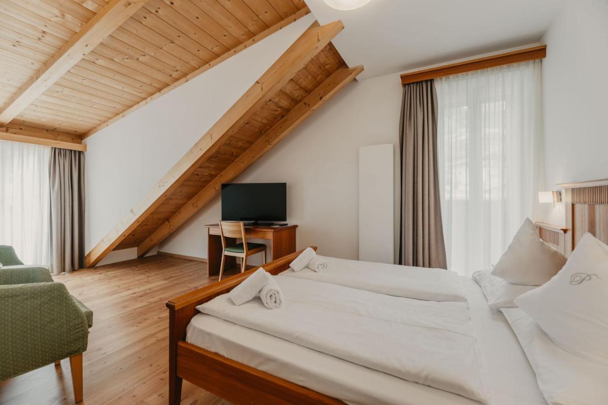 Hotel Garni Planaces - Housity