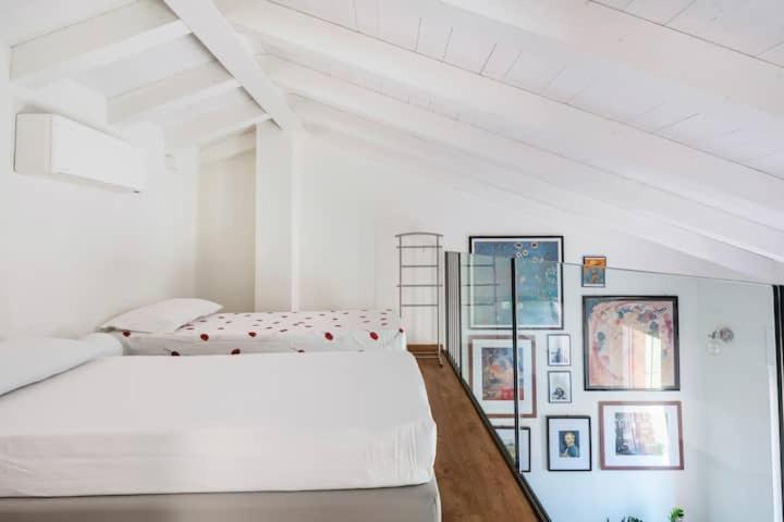 Domus: modern Loft in the center of Parma - Housity