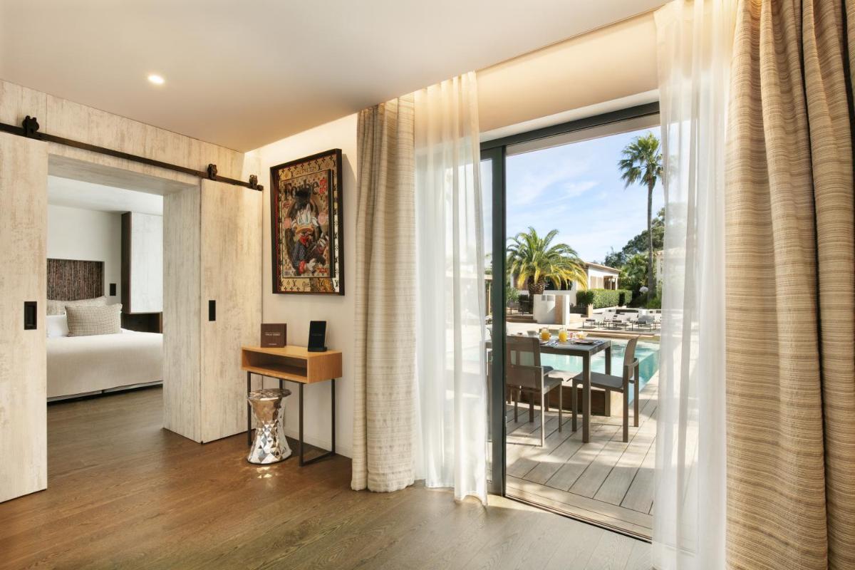 Un ou plusieurs lits dans un hébergement de l'établissement Villa Cosy, hotel & spa