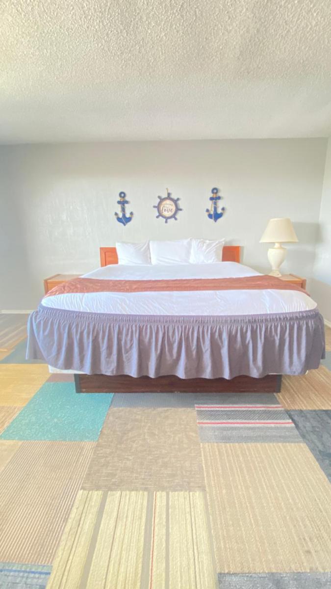 Ocean Shores Inn & Suites - Housity