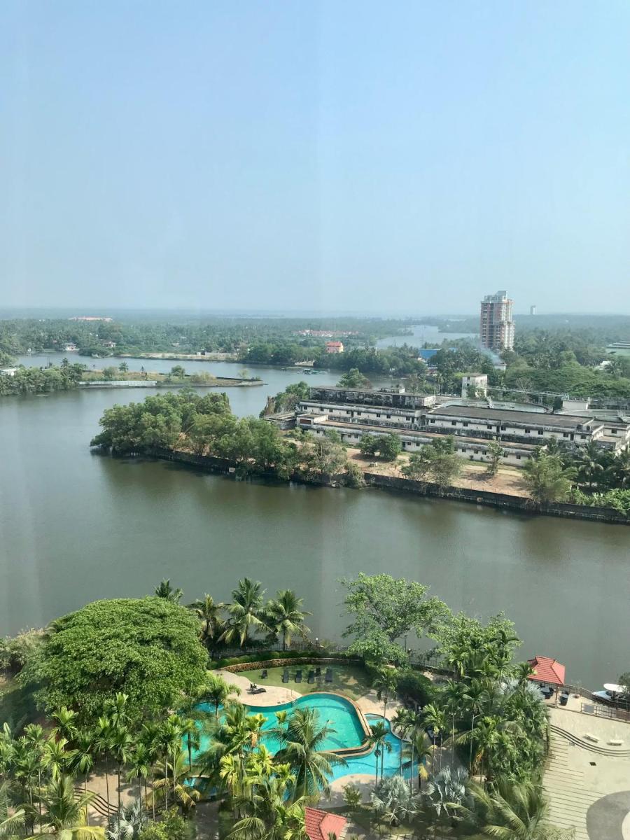 an aerial view of a river with a resort at Crowne Plaza Kochi by IHG in Cochin