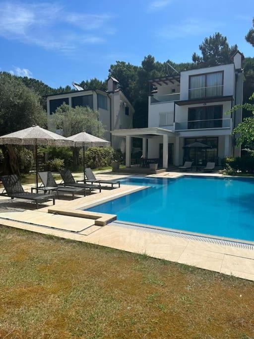 Beachfront Villa with Private Pool by Monika Experiences - Housity