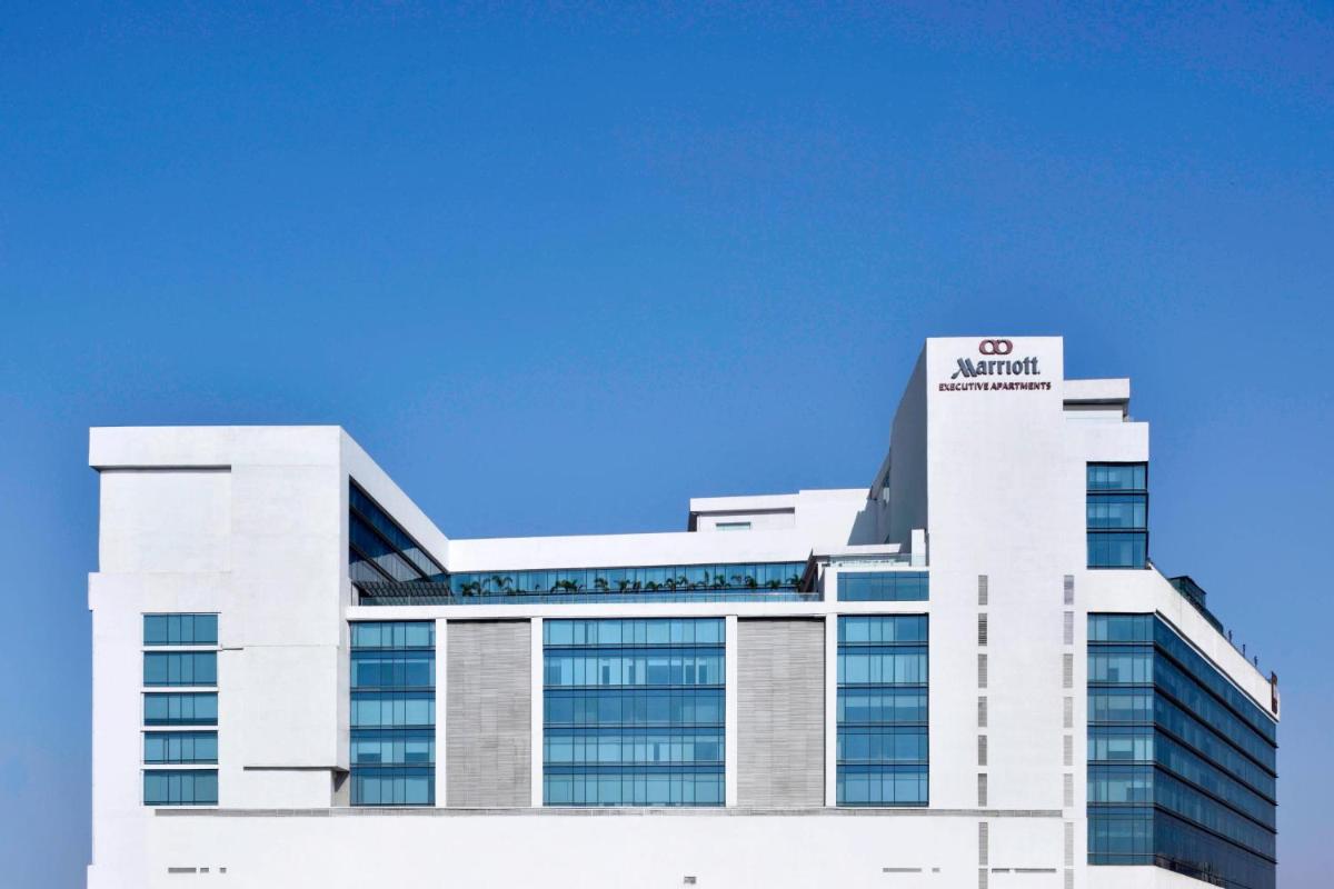 a building with a nvidia sign on top of it at Marriott Executive Apartments Hyderabad in Hyderabad