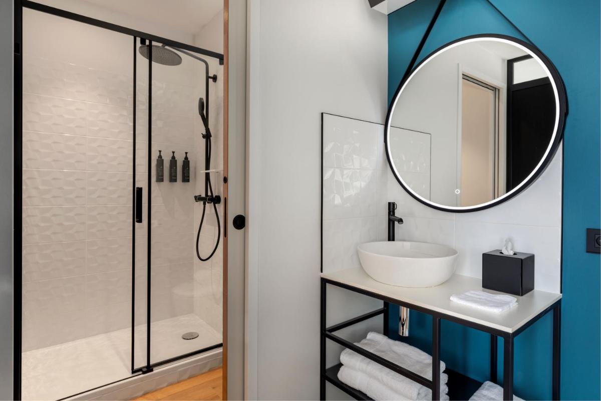 Salle de bains dans l'établissement Aloft Dijon