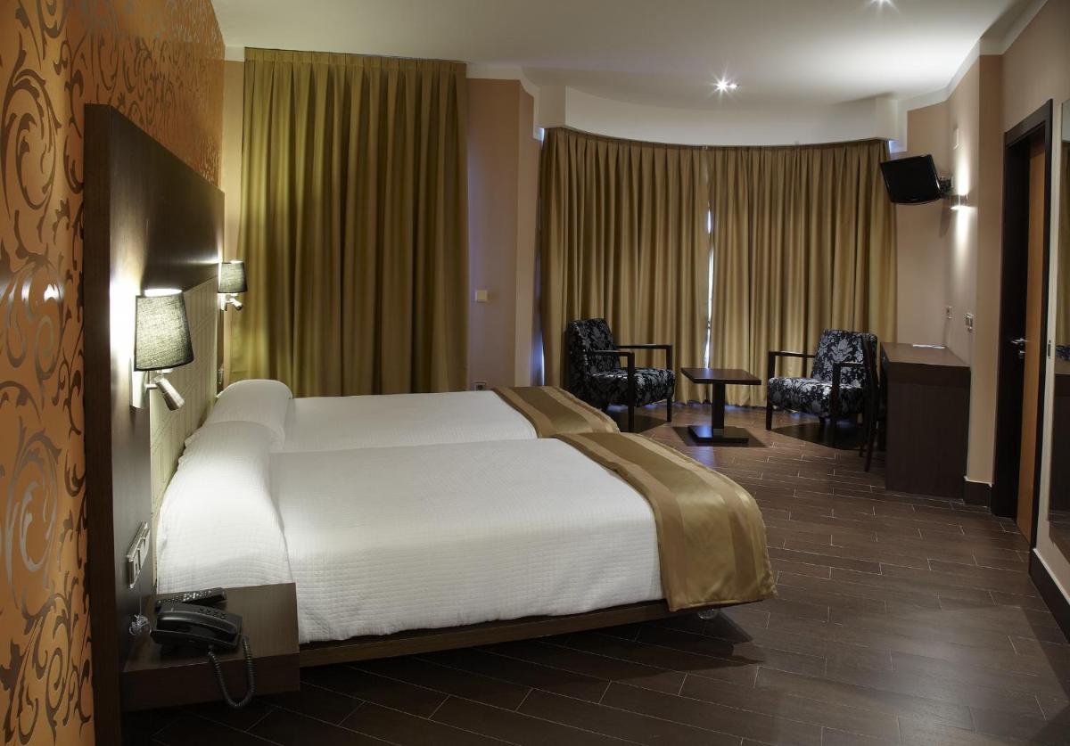 Cama o camas de una habitación en Blanco Hotel Spa