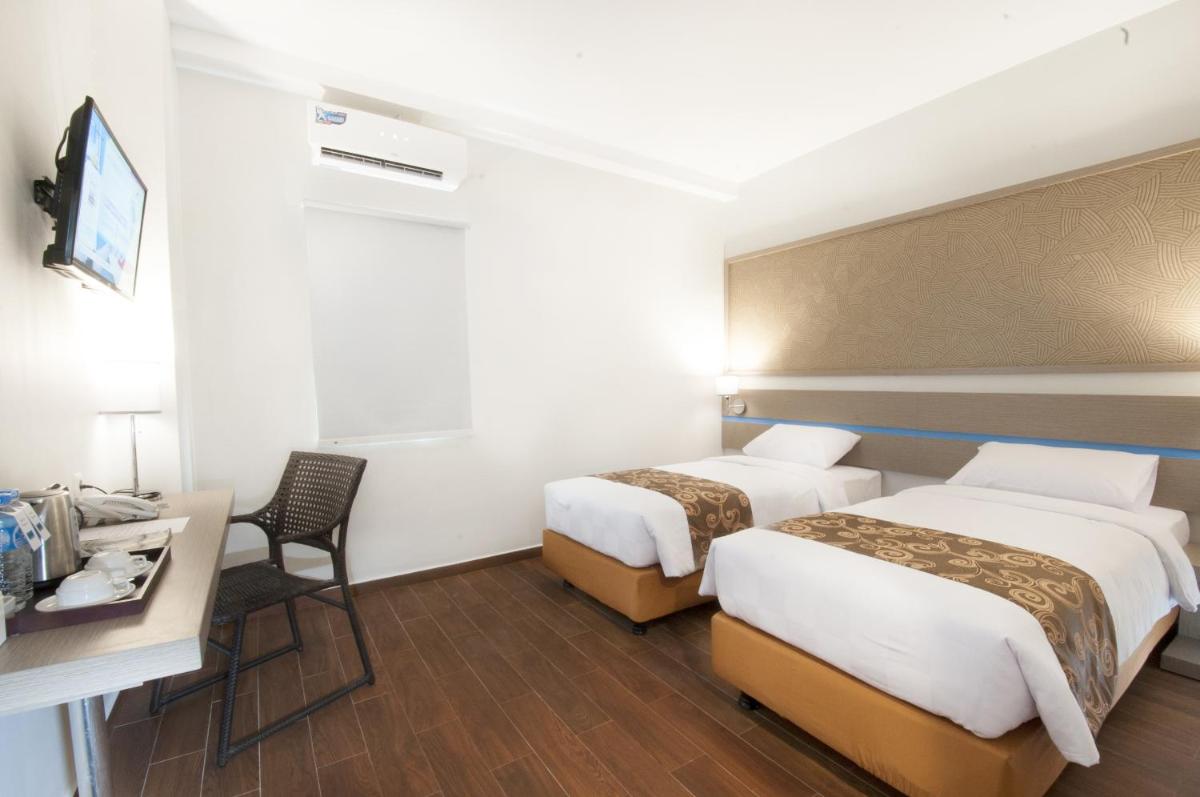 Genio Hotel Manado - Housity