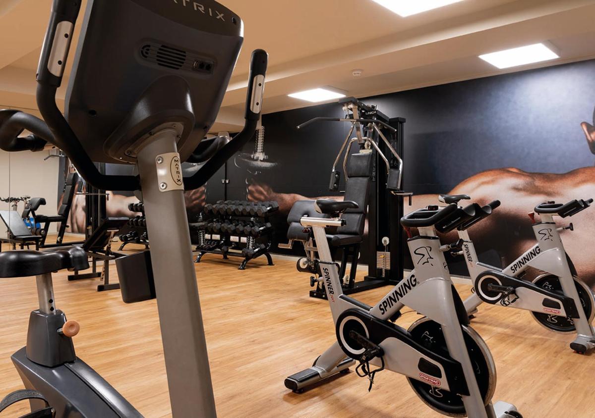 Gimnasio o instalaciones de fitness de AQUA Hotel Promenade & Spa 4Sup