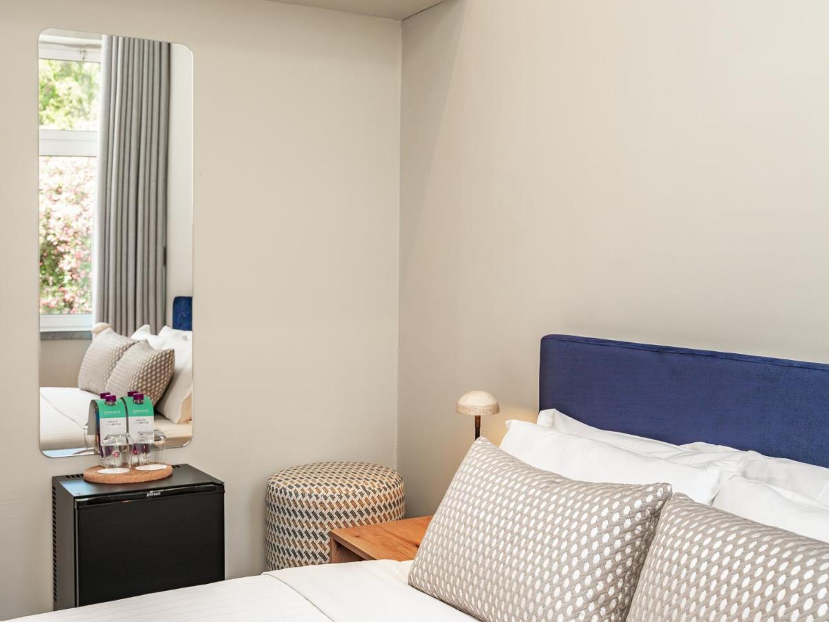 Uma cama ou camas num quarto em Villa Termal Spa Hotel - Villa Termal Spa Resort - by Unlock Hotels