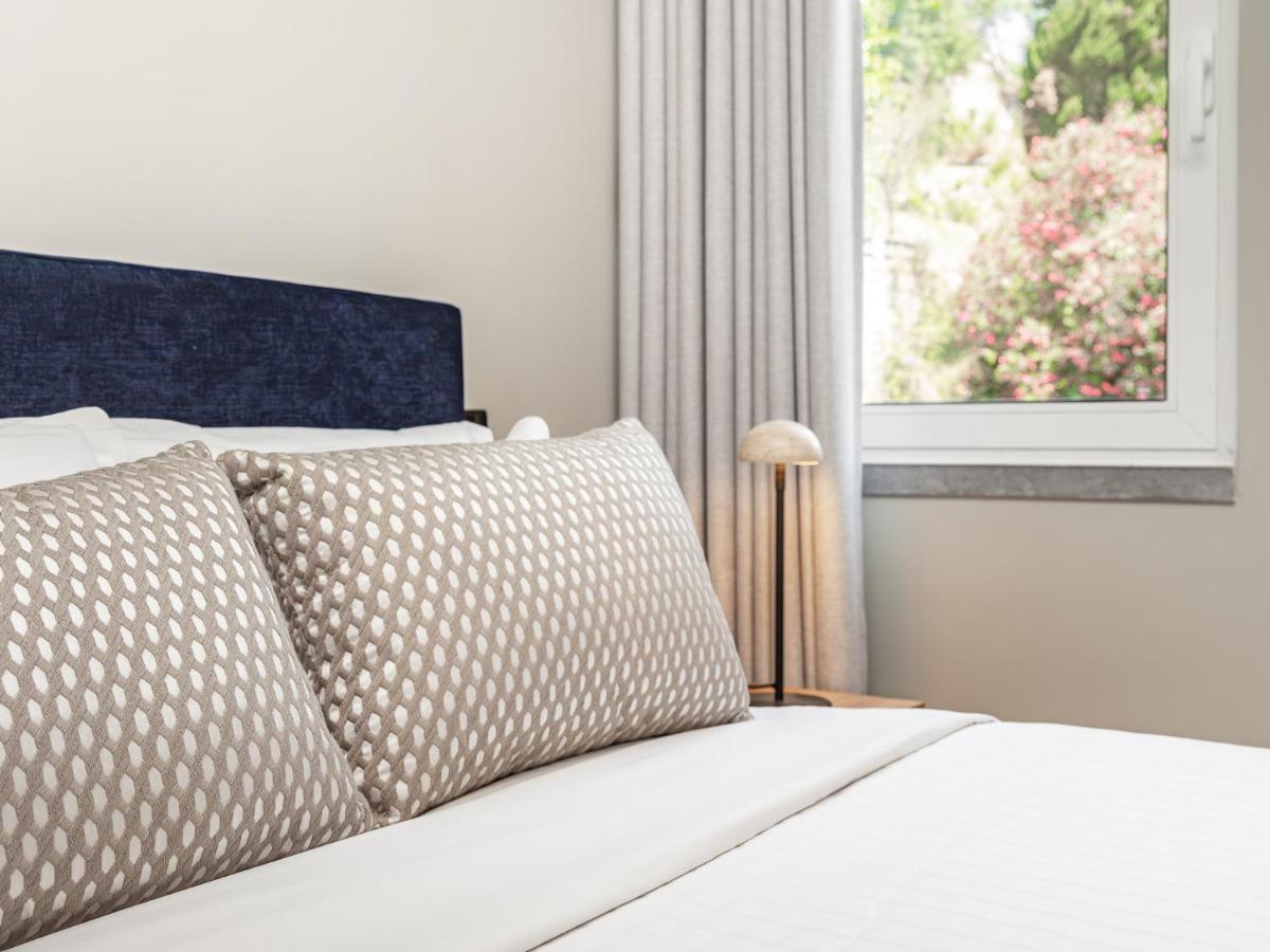 Uma cama ou camas num quarto em Villa Termal Spa Hotel - Villa Termal Spa Resort - by Unlock Hotels