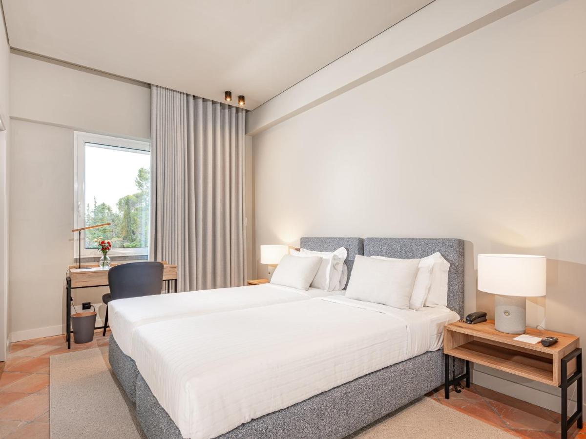 Uma cama ou camas num quarto em Villa Termal Spa Hotel - Villa Termal Spa Resort - by Unlock Hotels