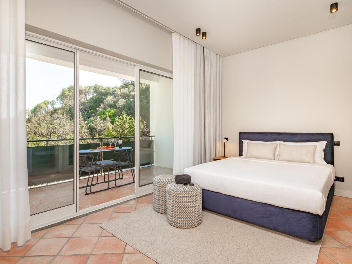 Uma cama ou camas num quarto em Villa Termal Spa Hotel - Villa Termal Spa Resort - by Unlock Hotels
