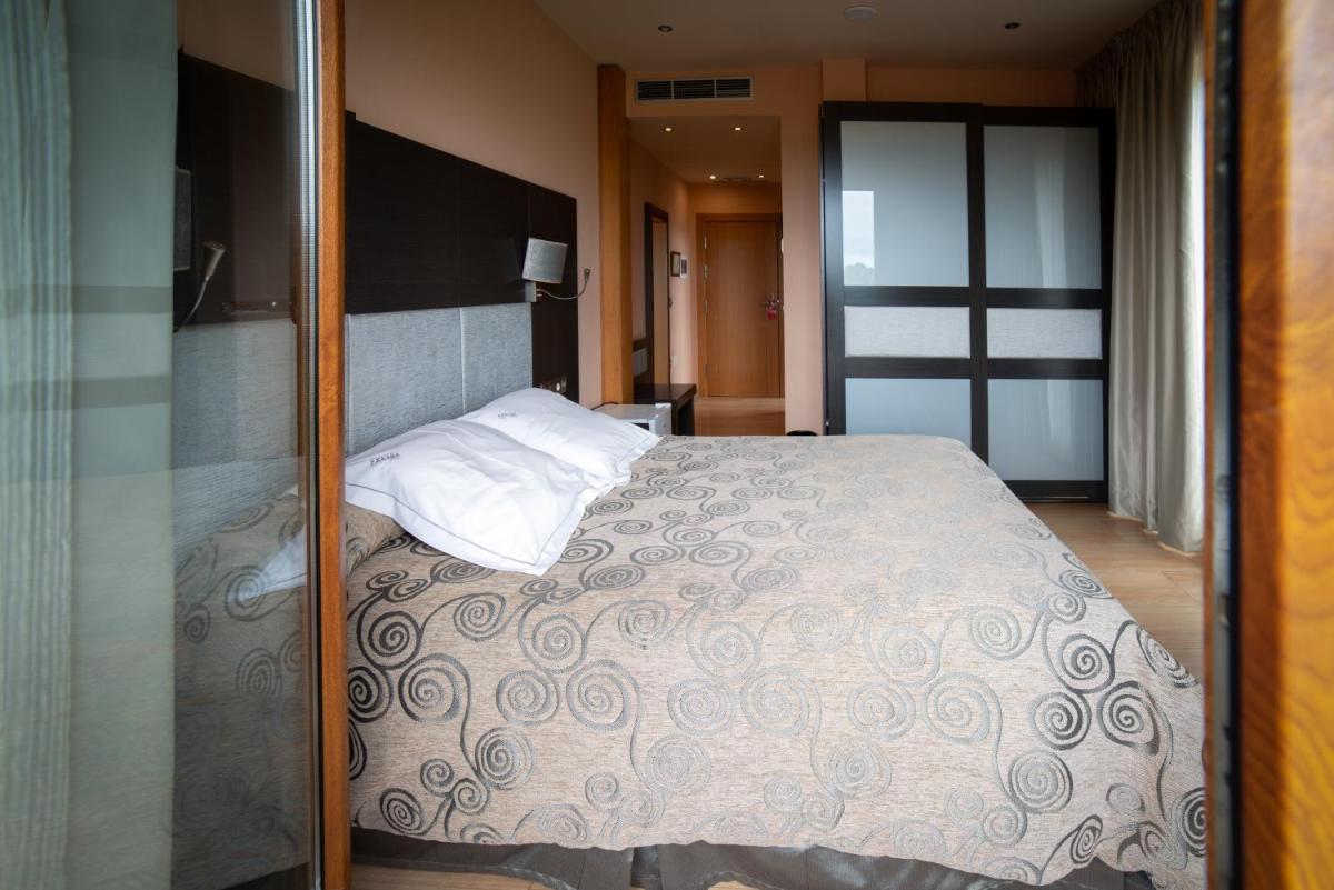 Cama o camas de una habitación en Hotel Felisa SPA