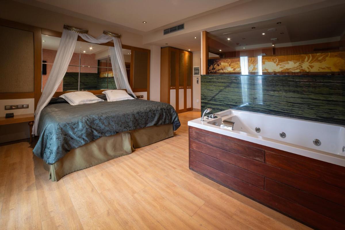 Cama o camas de una habitación en Hotel Felisa SPA