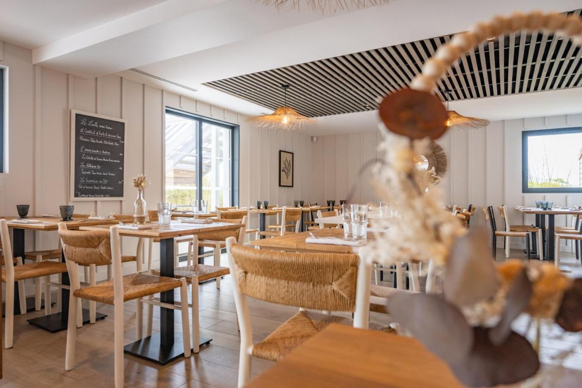 Restaurant ou autre lieu de restauration dans l'établissement Hôtel Atalante - Relais Thalasso & Spa