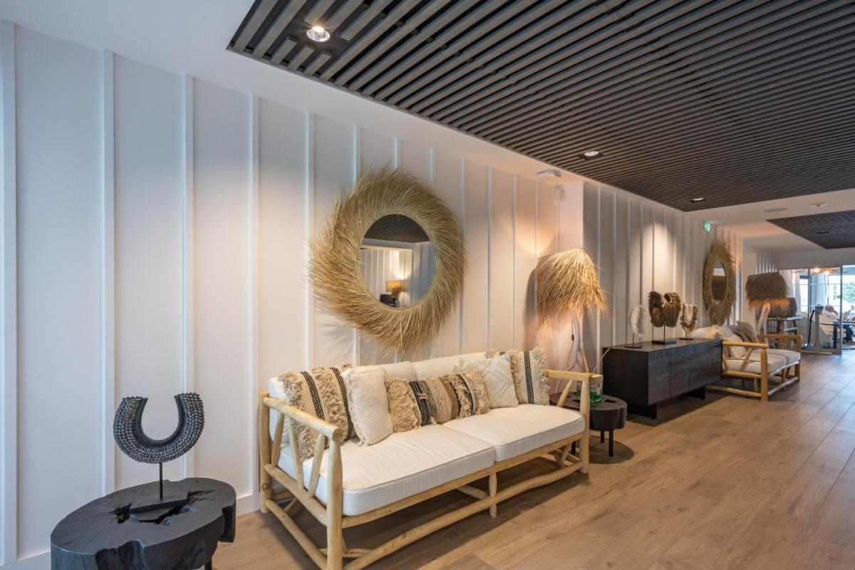 Coin salon dans l'établissement Hôtel Atalante - Relais Thalasso & Spa