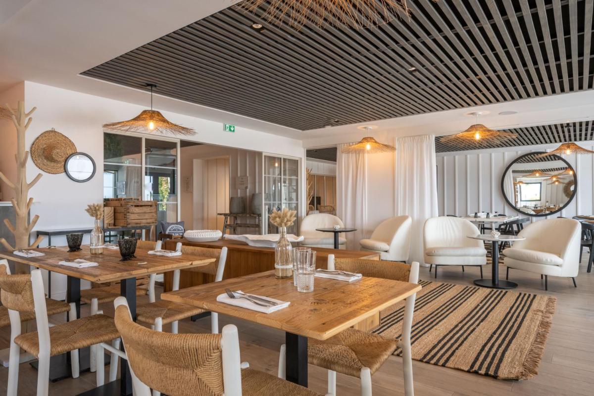 Coin salon dans l'établissement Hôtel Atalante - Relais Thalasso & Spa