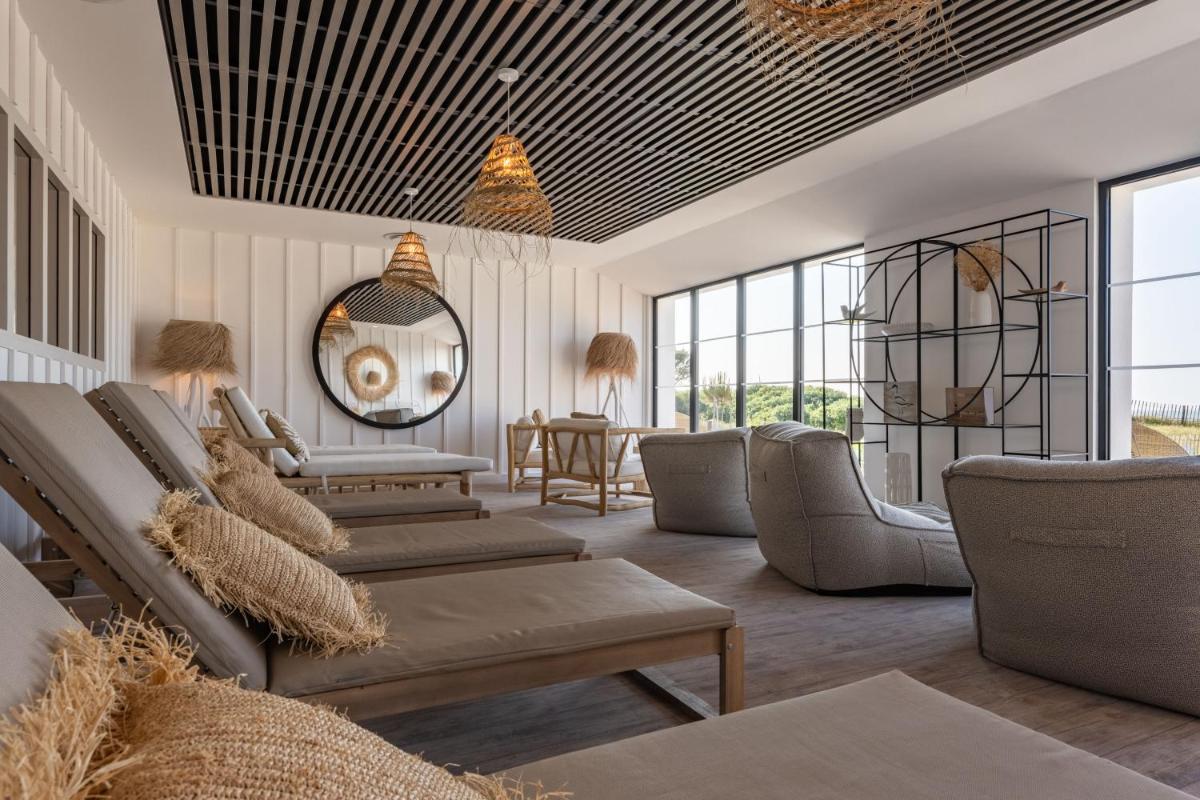 Coin salon dans l'établissement Hôtel Atalante - Relais Thalasso & Spa