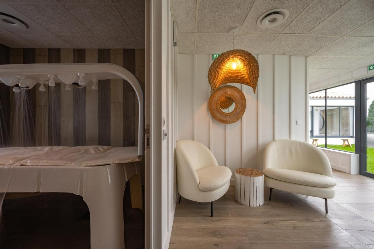 Coin salon dans l'établissement Hôtel Atalante - Relais Thalasso & Spa