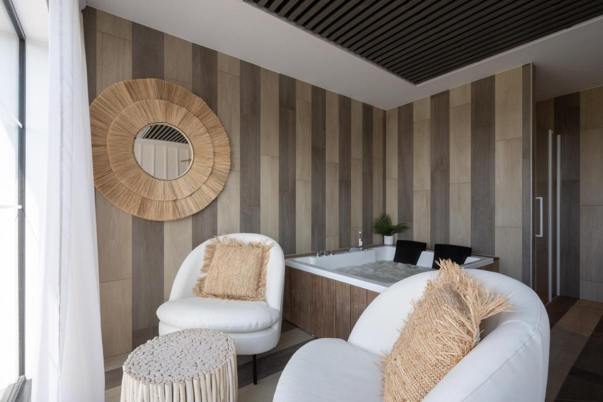 Un ou plusieurs lits dans un hébergement de l'établissement Hôtel Atalante - Relais Thalasso & Spa