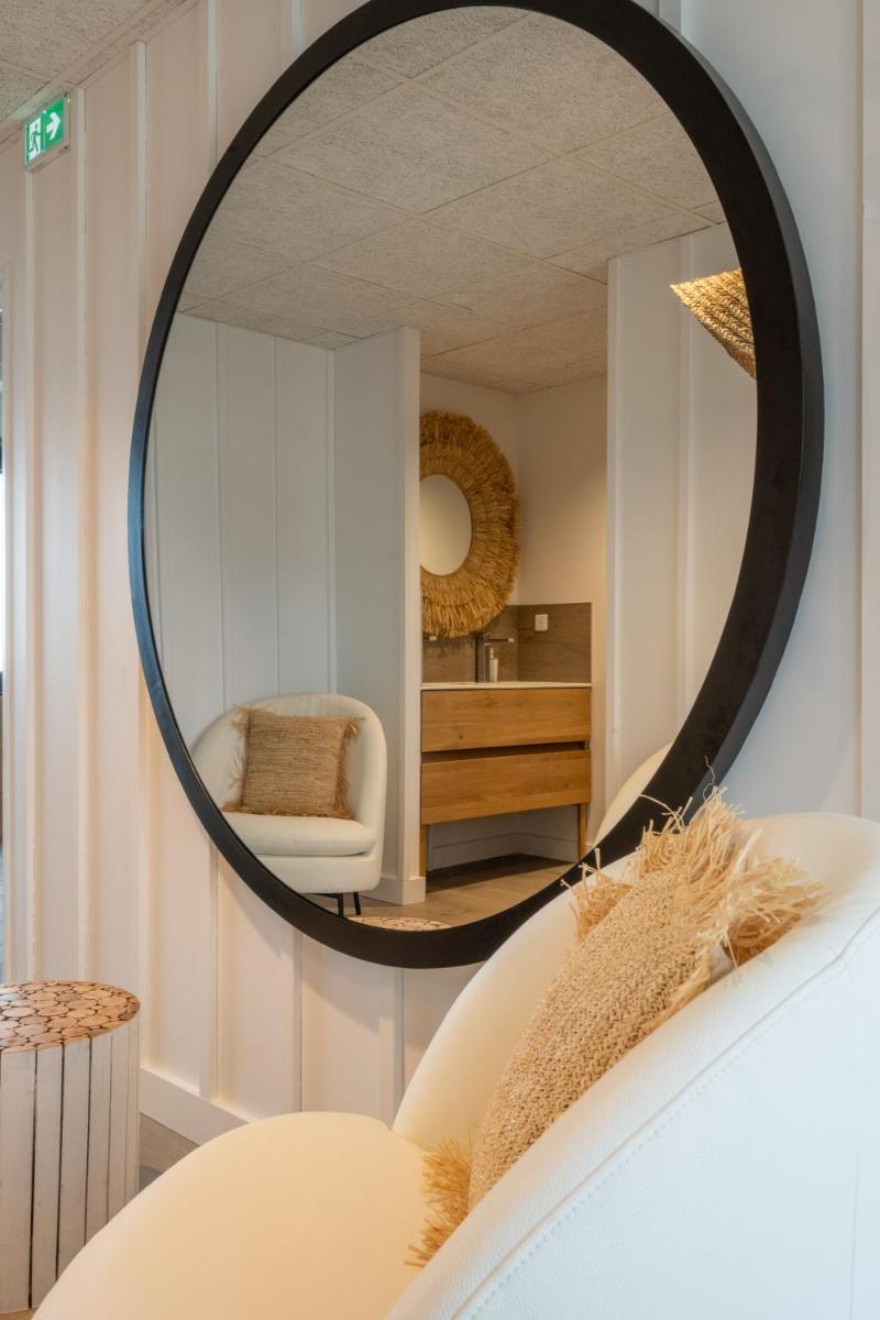 Un ou plusieurs lits dans un hébergement de l'établissement Hôtel Atalante - Relais Thalasso & Spa
