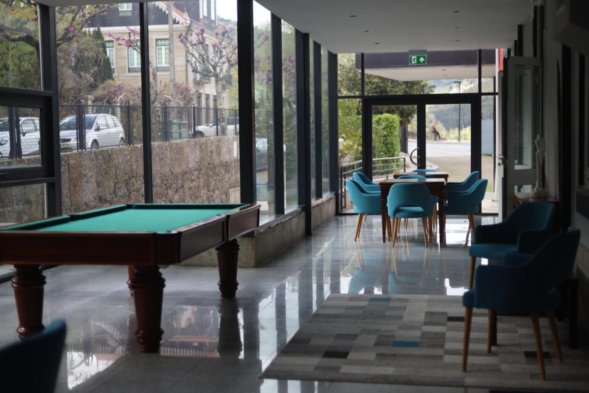Uma área de estar em Douro Marina Hotel & SPA
