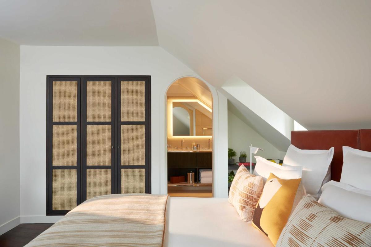 Un ou plusieurs lits dans un hébergement de l'établissement Hotel La Villa Saint Germain Des Prés