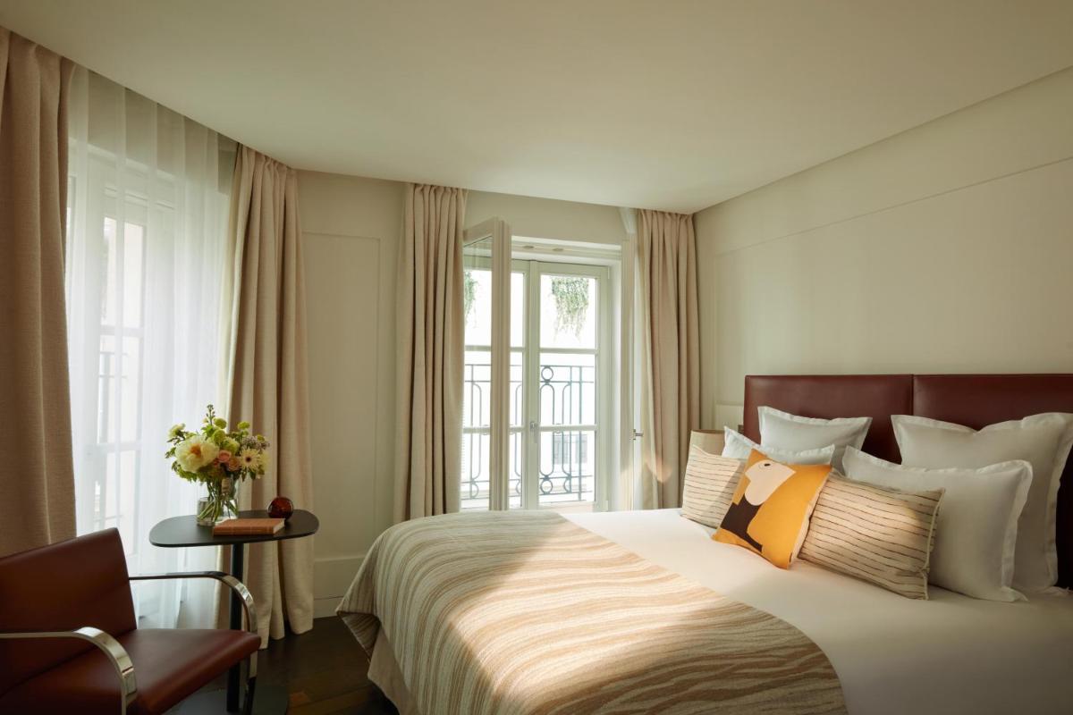 Un ou plusieurs lits dans un hébergement de l'établissement Hotel La Villa Saint Germain Des Prés