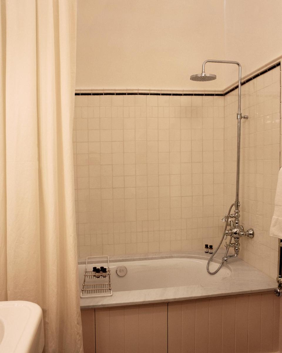 Salle de bains dans l'établissement Château Voltaire