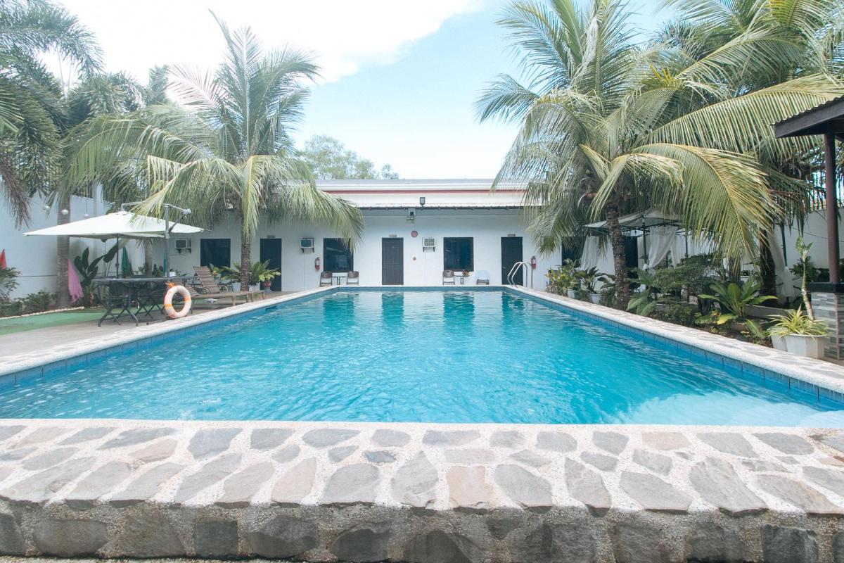 RedDoorz Plus at Palm Rise K Diving Resort Panglao Bohol - Housity